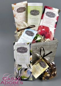 This gift box is filled with assorted gourmet dark chocolate bars, drinking chocolate, mendiants and mini chocolates made exclusively from Ethereal Confections